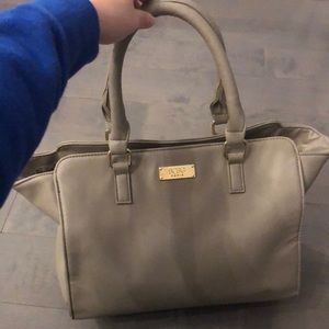 Gently used medium sized BCBG bag. Material appears water proof